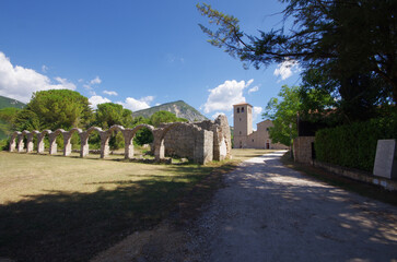 Abbey of San Vincenzo al Volturno, province of Isernia, Molise, Italy and in the foreground what remains of the Portico del Pellegrino