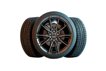 Three car tires with dark rims, aligned, against a black background