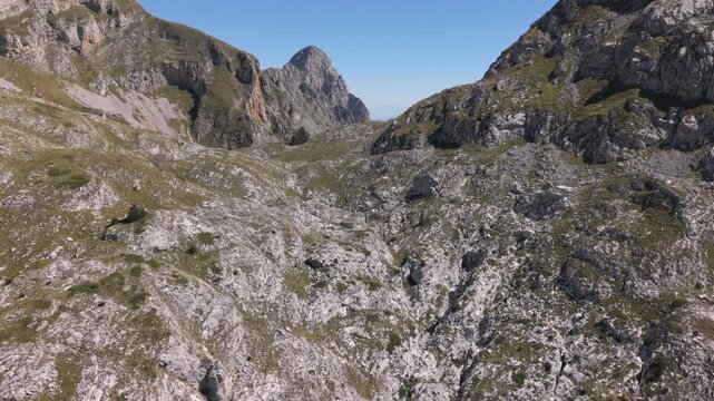 A hike day to the Albanian Mountains up to the border of Montenegro follow by a drone during Autumn or late summer season