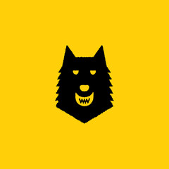 Black wolf head with sharp teeth on yellow background