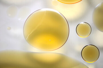Abstract Oil Droplets in Soft Liquid Background with Bubbles and Light