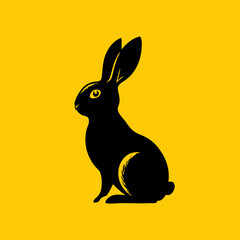 Black rabbit silhouette on yellow background