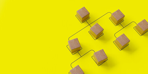 Company hierarchical organizational chart made of wooden cubes on a blue background, representing human resources management,