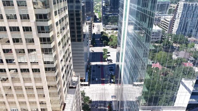Cars, trucks and trailer movement in downtown Austin, Texas. A true representation of a typical day in the capital's urban core. Aerial drone 4k view
