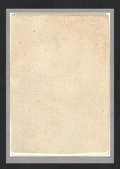 Blank aged paper sheet with textured surface and framed border