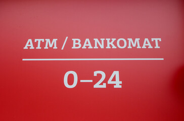ATM cash machine. ATM sign. 0-24h. Sign for Cash machine. ATM on the street.