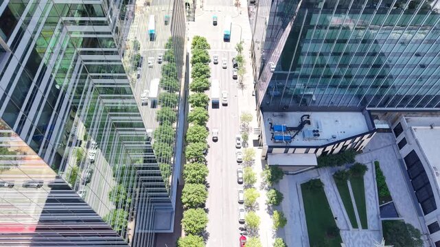 Cars, trucks and trailer movement in downtown Austin, Texas. A true representation of a typical day in the capital's urban core. Aerial drone 4k view