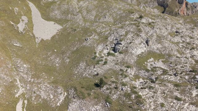 A hike day to the Albanian Mountains up to the border of Montenegro follow by a drone during Autumn or late summer season