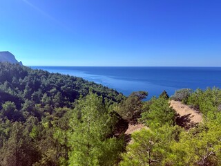 fantastic blue seascape, rocky sea coast, blue sea and blue sky