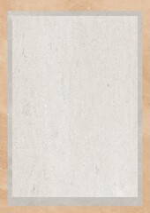 Blank textured paper with light gray border on beige background