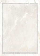 Close-up of a light-colored marble surface with subtle veining and a framed border