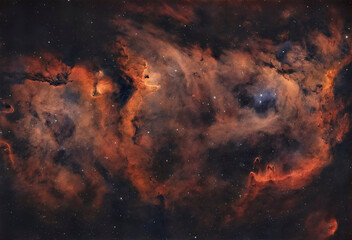 Ionized by the radiation from young, hot stars, the Soul Nebula contains glowing clouds of hydrogen, oxygen, and sulfur gases. It is located about 7,500 light years from Earth.