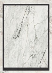Close-up of white marble with black veining framed in black border