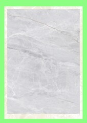 Close-up of light gray marble surface with natural veining patterns