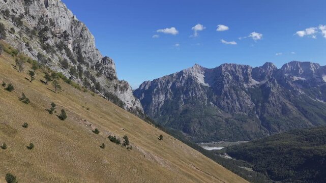 A hike day to the Albanian Mountains up to the border of Montenegro follow by a drone during Autumn or late summer season