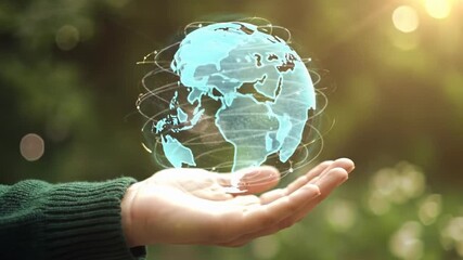 Extreme close-up on a gender-neutral hand in forest green cradling a luminous 3D holographic Earth with golden data lines, against blurred green foliage with bokeh, concept of sustainable technology - Powered by Adobe