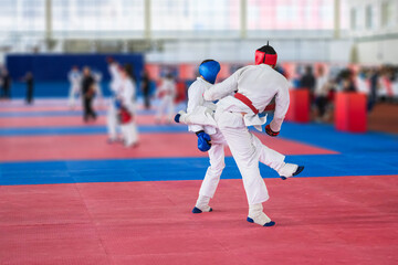 A karate or taekwondo sports competition.