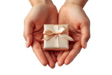 Pair of hands gently holding a wrapped present tied with a ribbon in front of transparent background