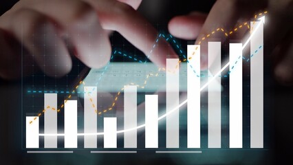 Engaging hands interact with a smartphone, displaying growth charts and statistics, showcasing...
