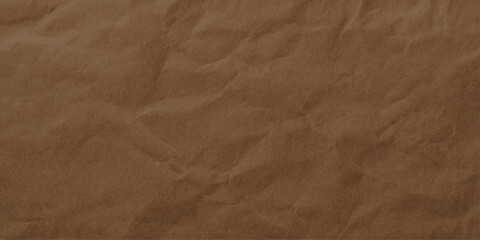An antique brown paper texture with crumpled, rough, wrinkled, and creased vintage leather-like surface