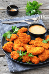 breaded chicken breast chunks with dipping sauce