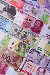 Paper money, banknotes of different countries as a business background. Paper money and cash