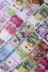 Paper money, banknotes of different countries as a business background. Paper money and cash