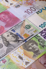 Paper money, banknotes of different countries as a business background. Paper money and cash