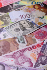 Paper money, banknotes of different countries as a business background. Paper money and cash