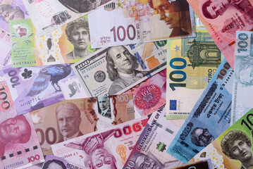 Paper money, banknotes of different countries as a business background. Paper money and cash