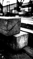 Wooden logs stacked at a construction site in a bustling urban area during a cloudy afternoon