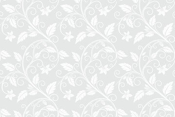 Elegant white floral seamless pattern with delicate vines and leaves, classic ornamental background for luxury wallpaper, textile, wrapping, wedding, and modern decorative design. © IT park