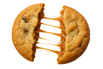 Pulling Apart a Warm, Soft-Baked Cookie Revealing a Golden Toffee Center