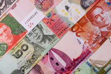 Paper money, banknotes of different countries as a business background. Paper money and cash