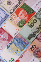 Paper money, banknotes of different countries as a business background. Paper money and cash