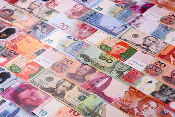 Paper money, banknotes of different countries as a business background. Paper money and cash