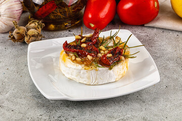 Baked camembert cheese with honey