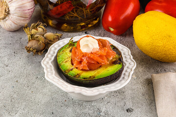 Whole grilled avocado with salmon