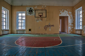  An old abandoned gym. Light coming from the windows. A beautiful abandoned gym.