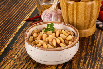 Baked white canned beans in the bowl