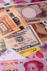 Paper money, banknotes of different countries as a business background. Paper money and cash