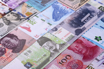 Paper money, banknotes of different countries as a business background. Paper money and cash