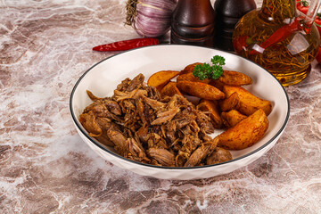 Baked shredded pork with potato
