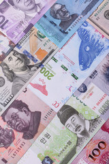 Paper money, banknotes of different countries as a business background. Paper money and cash