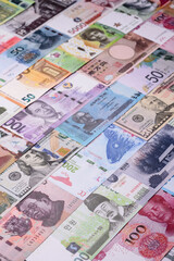 Paper money, banknotes of different countries as a business background. Paper money and cash