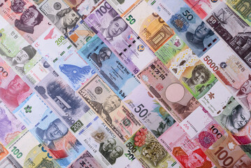 Paper money, banknotes of different countries as a business background. Paper money and cash