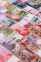 Paper money, banknotes of different countries as a business background. Paper money and cash