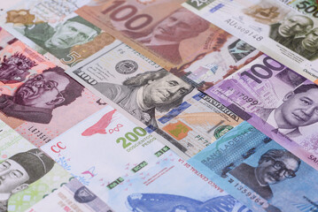 Paper money, banknotes of different countries as a business background. Paper money and cash