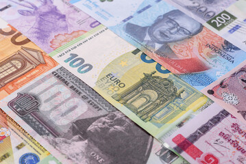 Paper money, banknotes of different countries as a business background. Paper money and cash