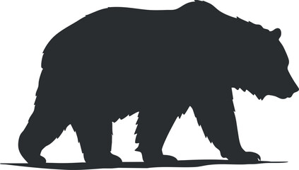 A silhouette of a bear walking, representing wildlife and nature in its natural habitat.